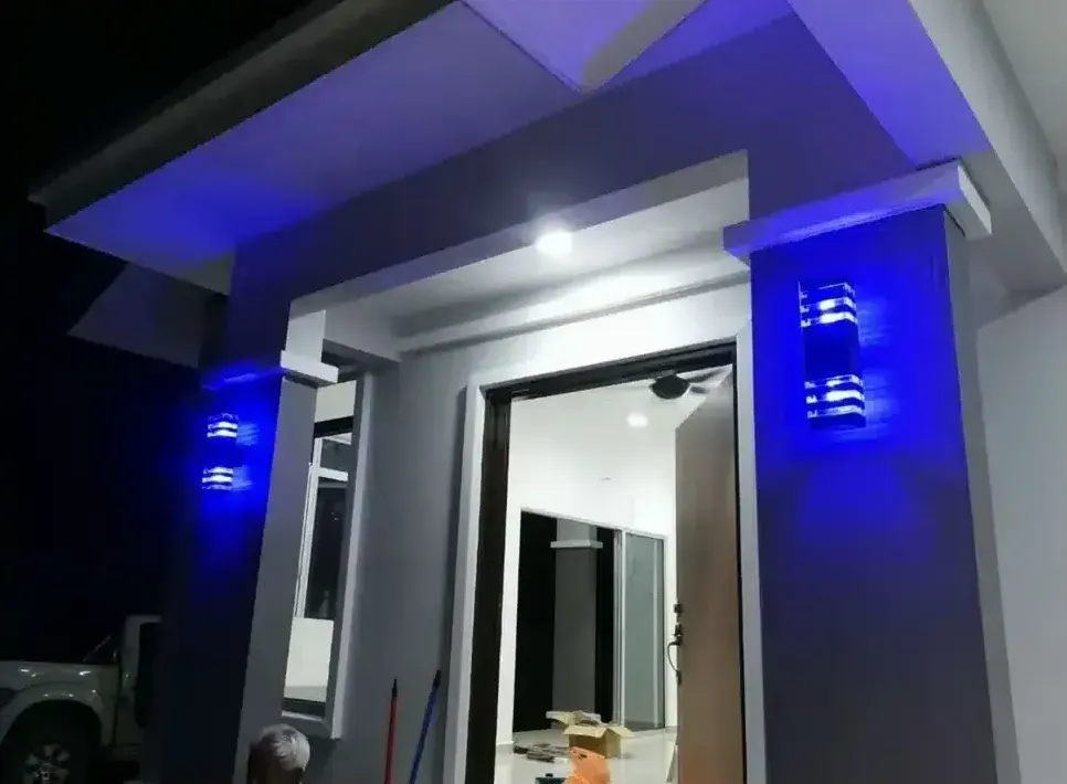 RumahHQ project in Ijok: a finished front porch with feature lighting at dusk